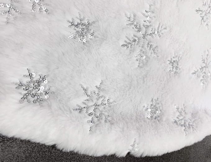 White Christmas tree skirt with sequin snowflake decorations