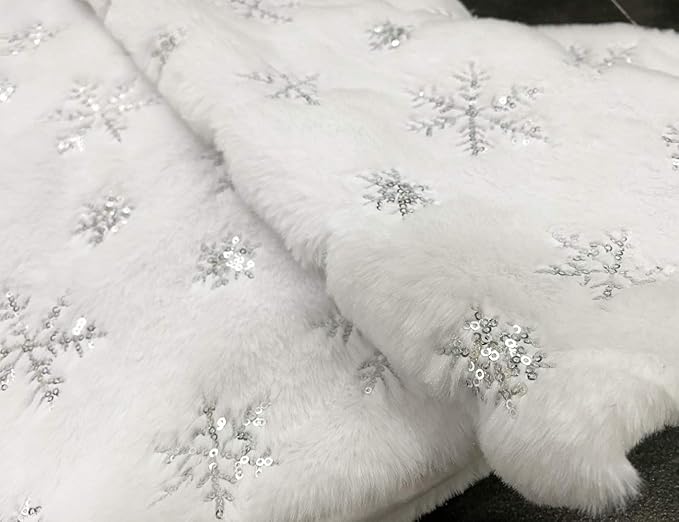White Christmas tree skirt with sequin snowflake decorations